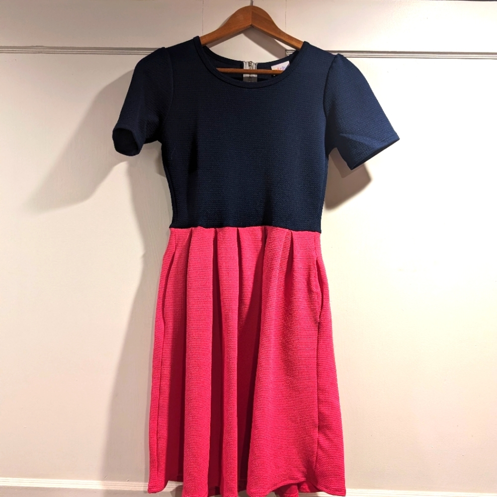 Navy and pink short sleeve dress. Has pockets